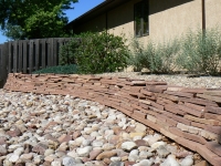 Rustic Retaining Wall Made from Steppers